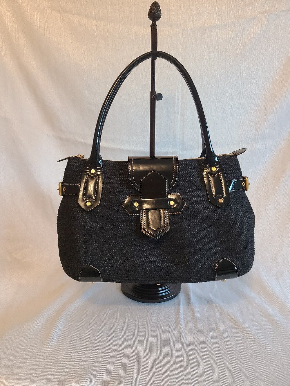 Black Woven Squishee shoulder bag by Eric Javits